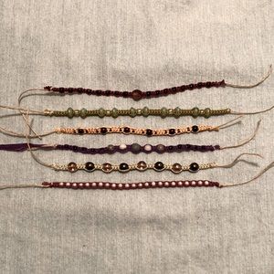 6 tie on bracelets/anklets